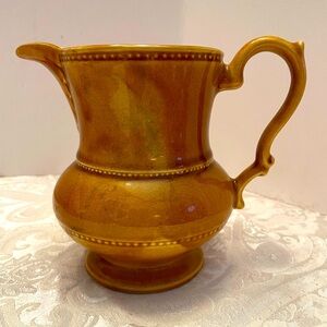 Lord Nelson pottery - England - pitcher  H @5.75”.  Carmel glaze